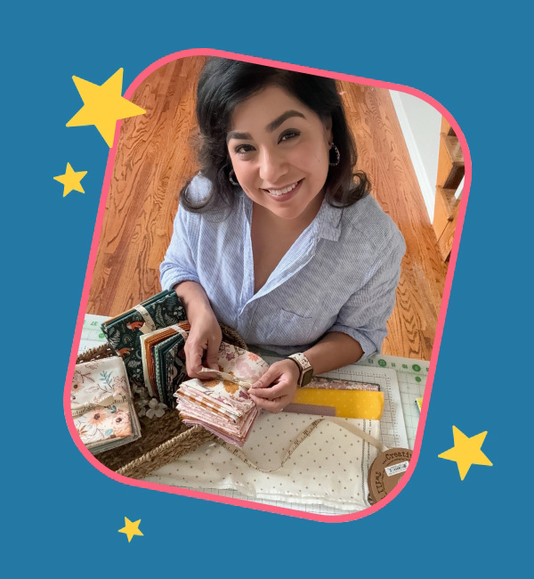 Victoria picking the perfect pieces for her next quilt!